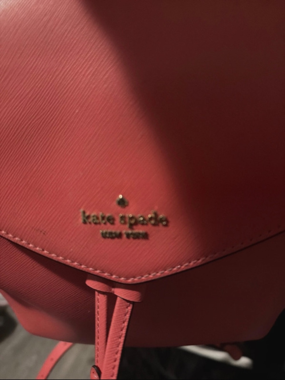 kate spade coral backpack with gold logo